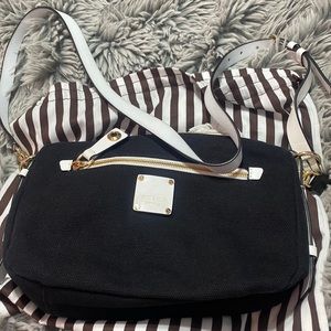 A black and white Henri Bendel bag